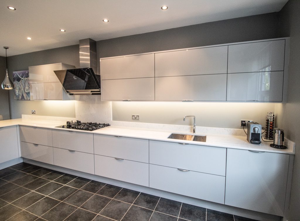 Gloss Finish Kitchen in Light Grey. Supplied and Installed by Noble Kitchens, Coventry and Warwickshire